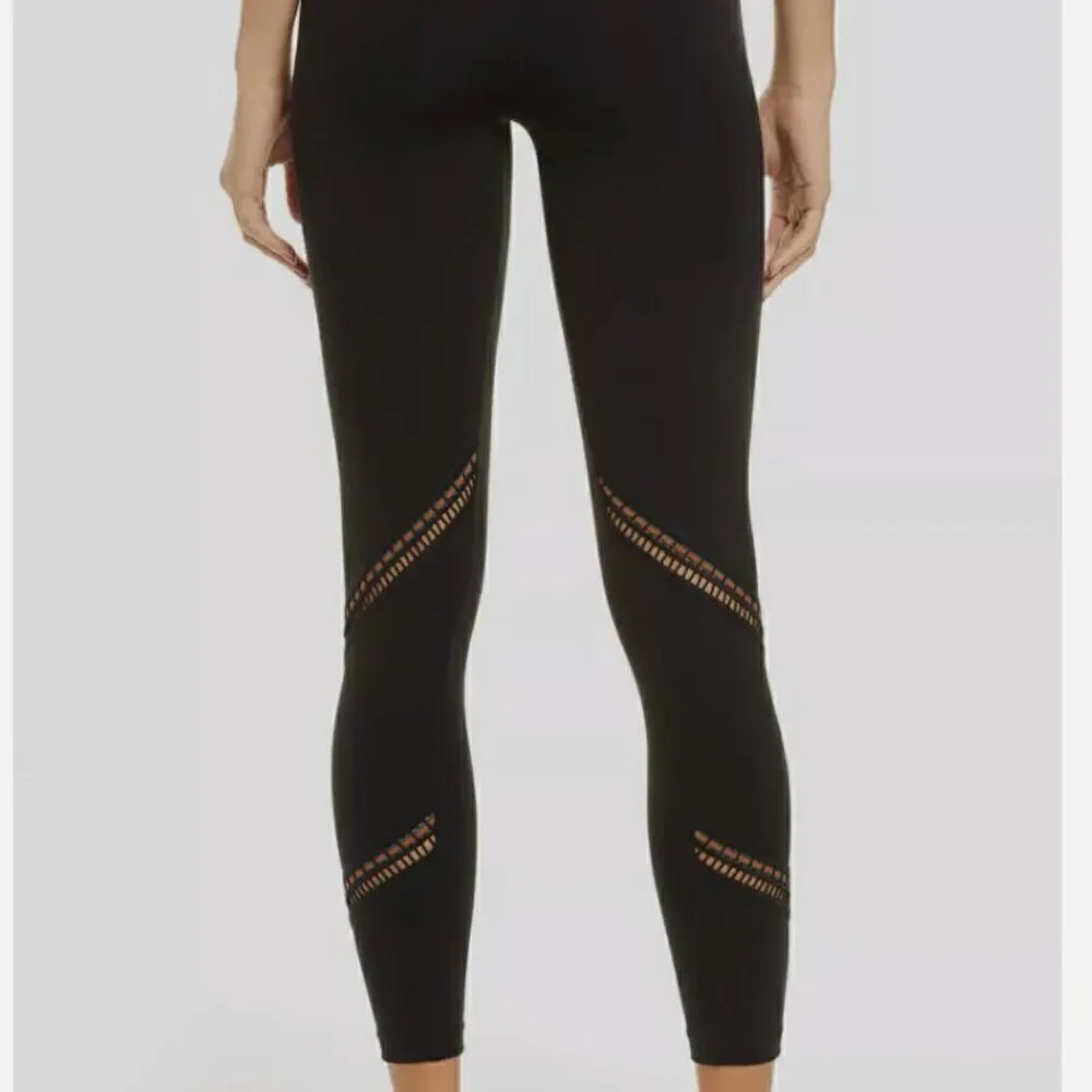 Free People Movement Ascend Black Leggings with ribbon and cutout details